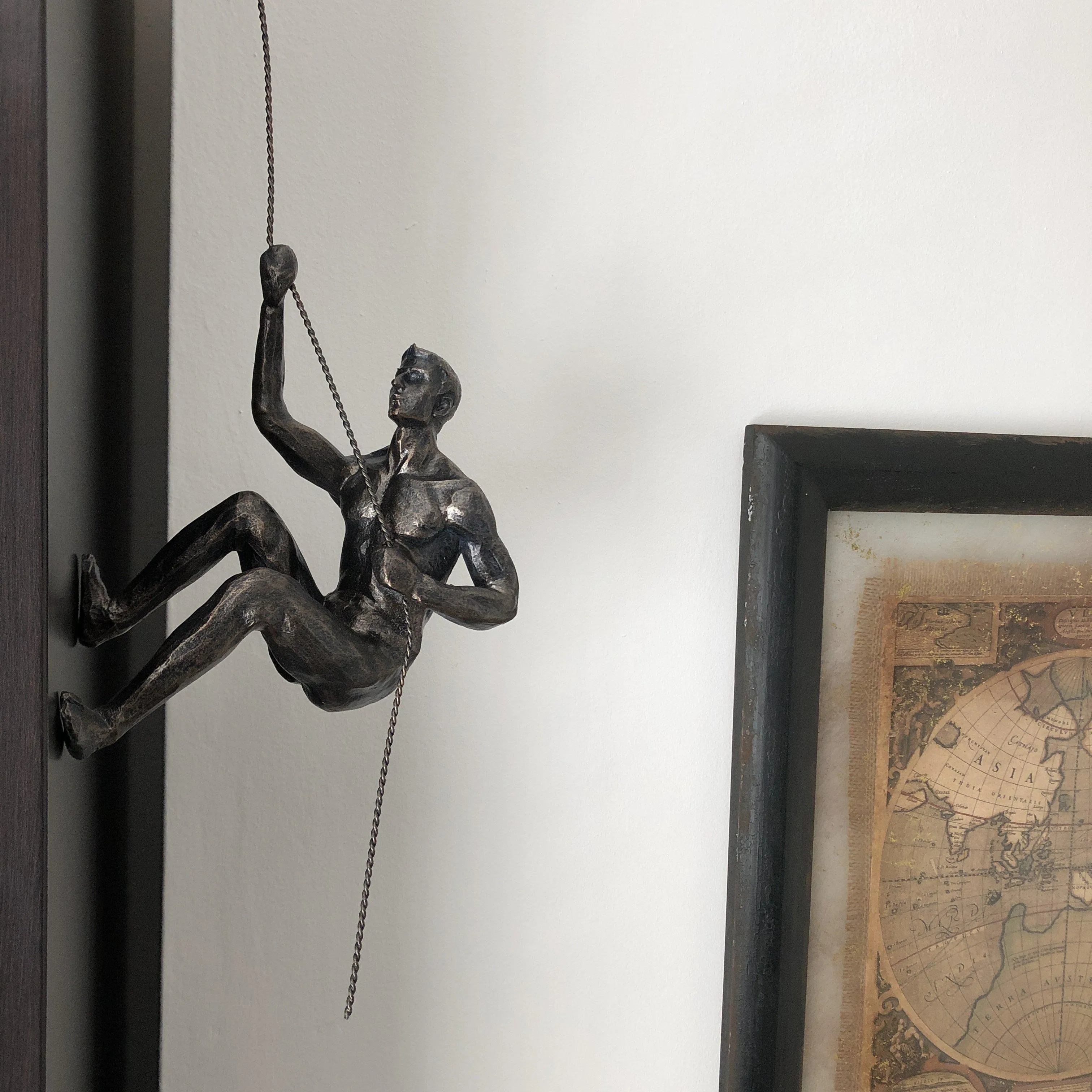 Bronze Climbing Man