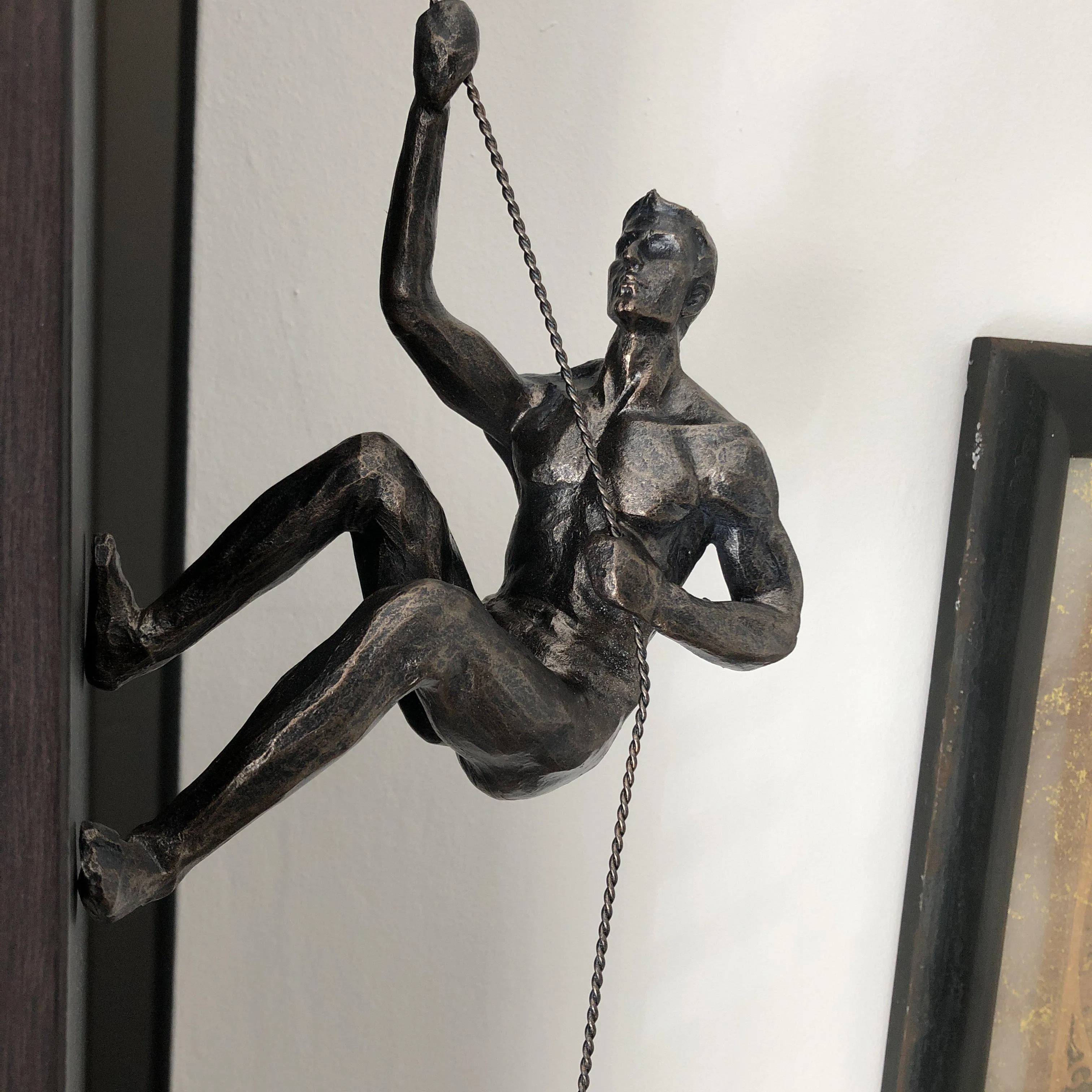 Bronze Climbing Man