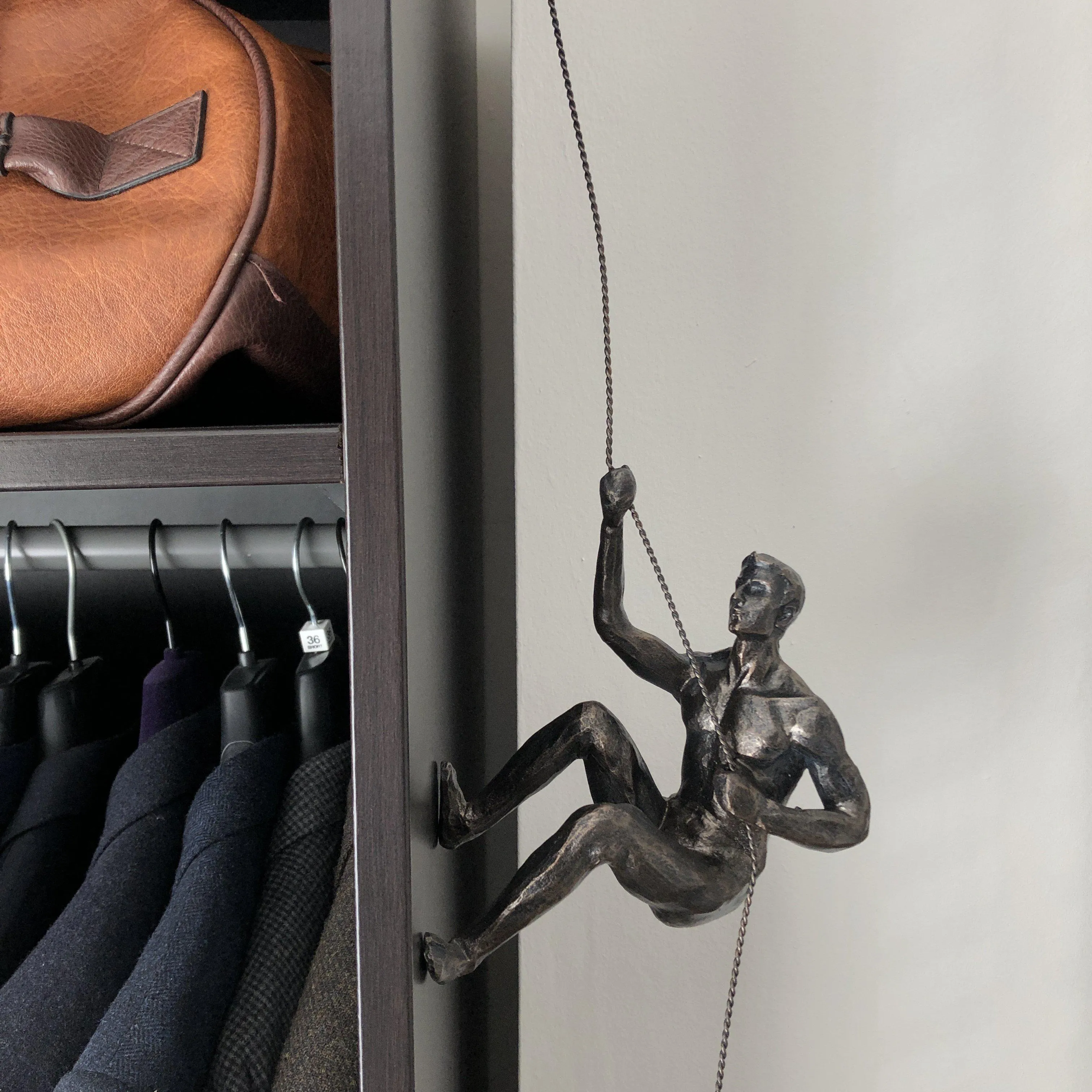 Bronze Climbing Man